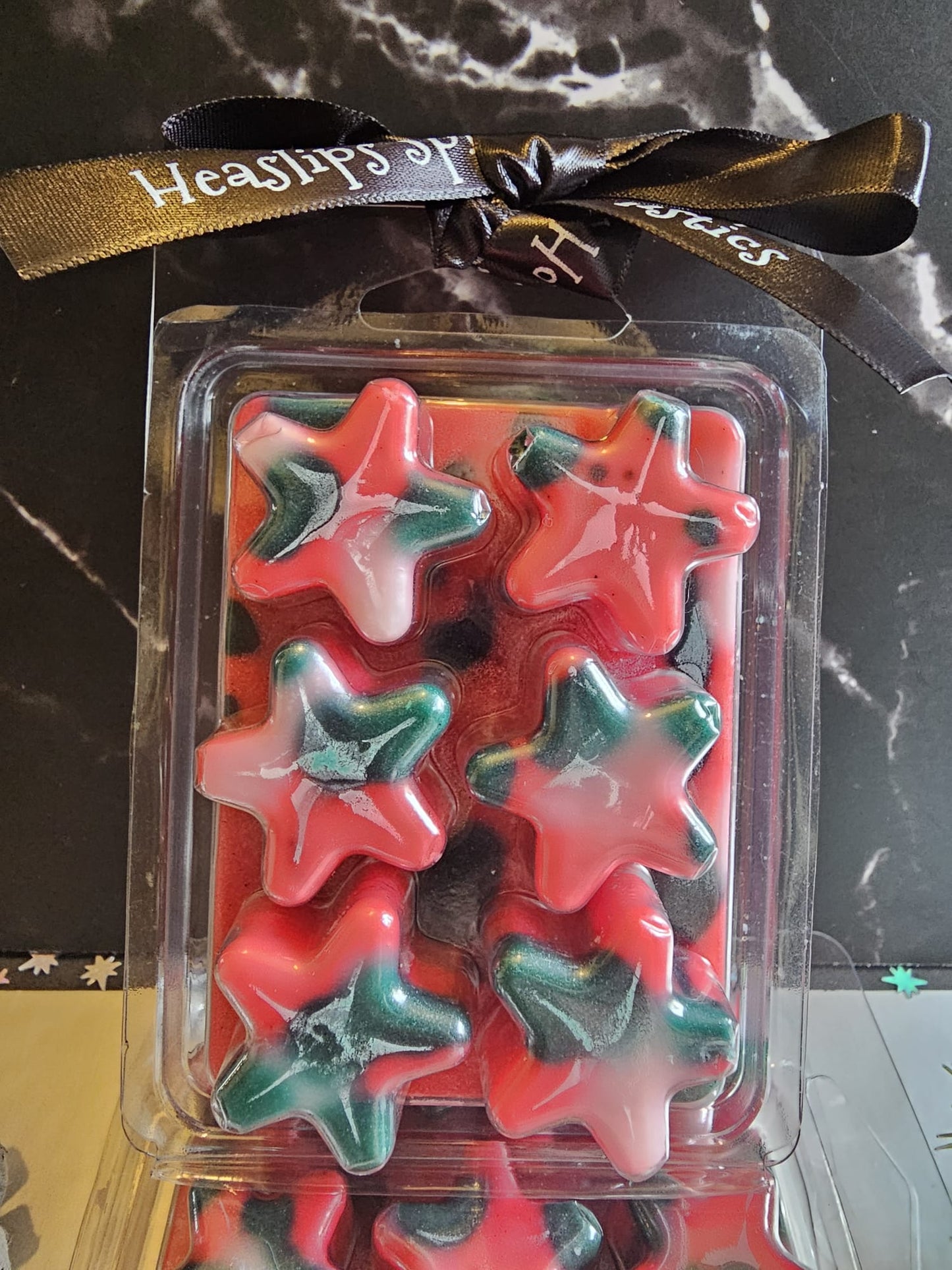 Star shaped wax melt clamshell Christmas themed in fragrance Candy Cane