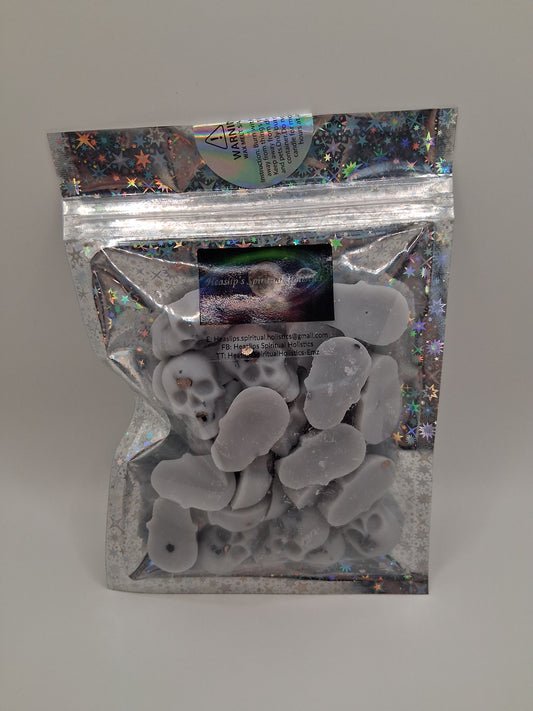 50g bag of Velvet Rose & Oud fragranced mini skull wax melts