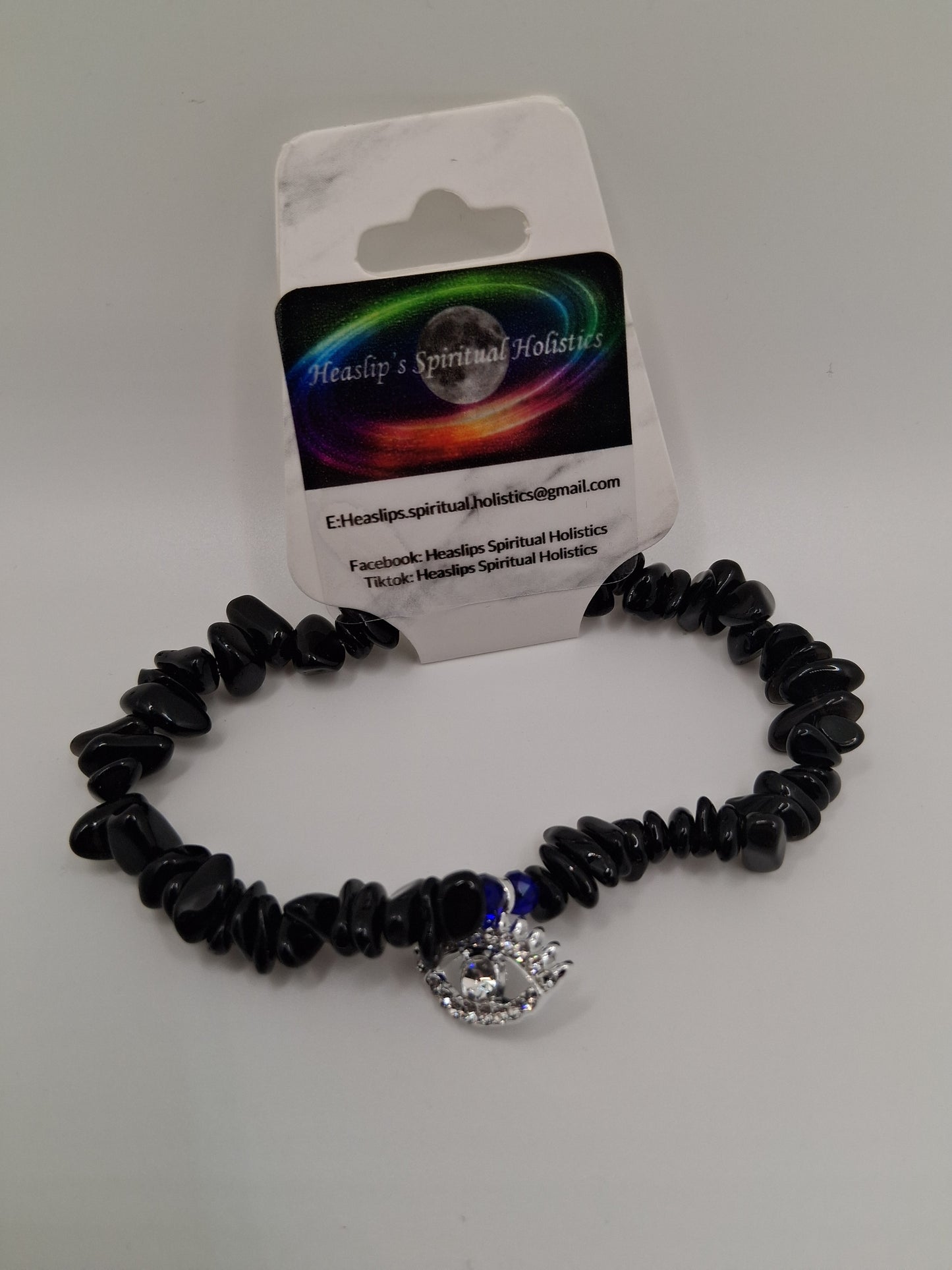Obsidian crystal chip & silver evil eye charm bracelet