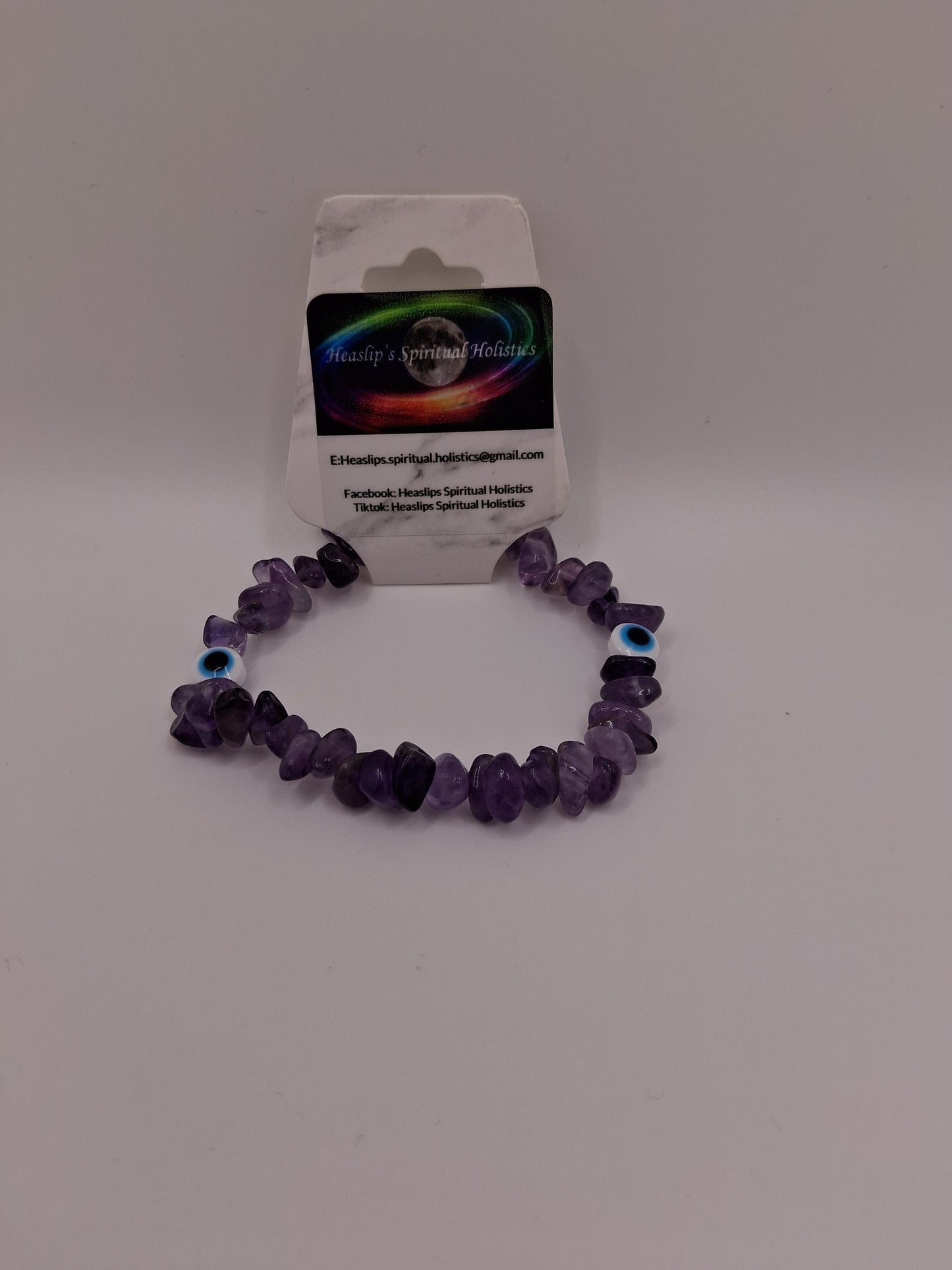 Amethyst chip and white evil eye bead bracelet