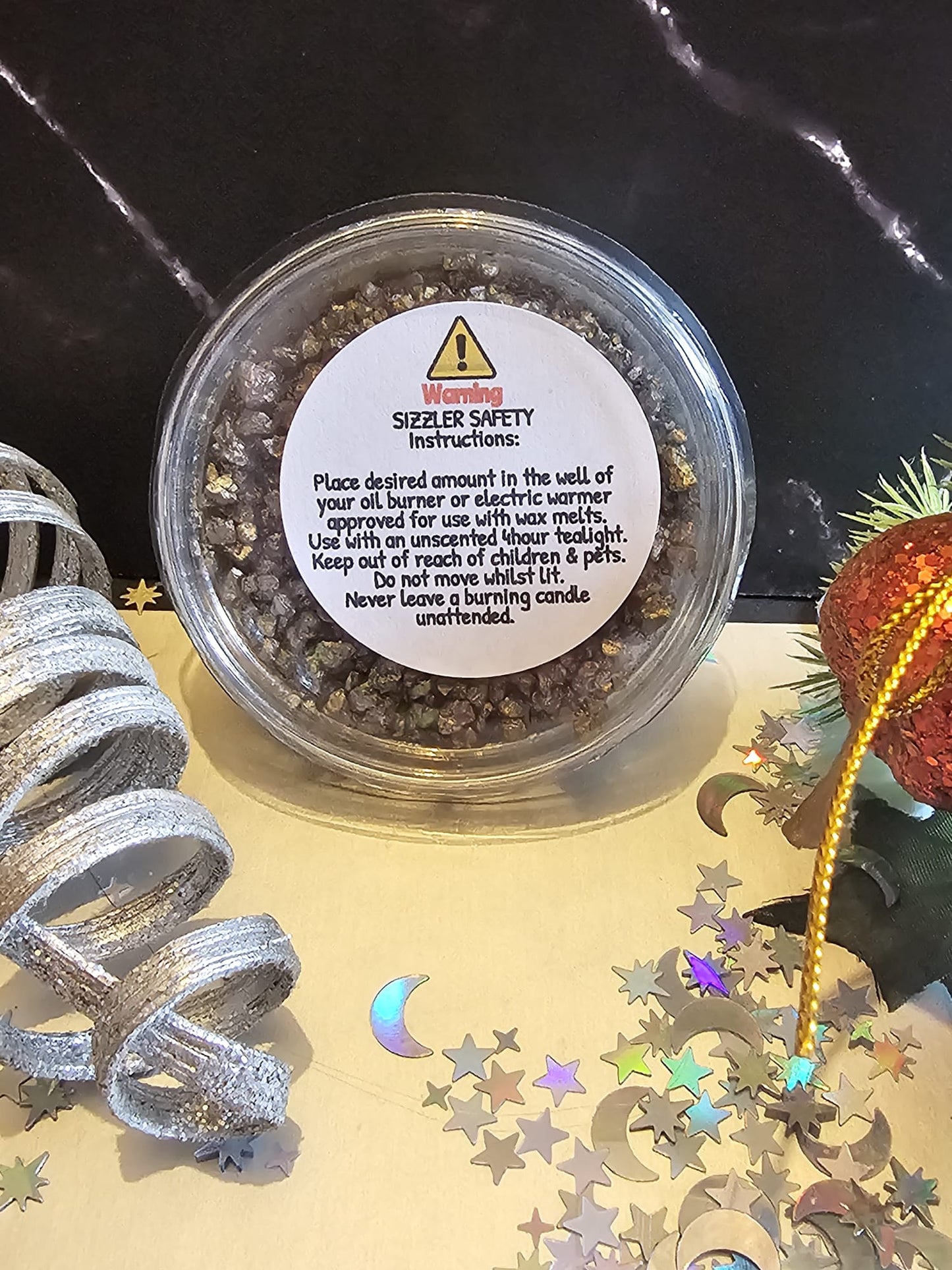 Simmering granules (Wax Melt) in a Christmas fragrance Ginger Spice